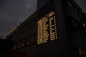 airport departure board night